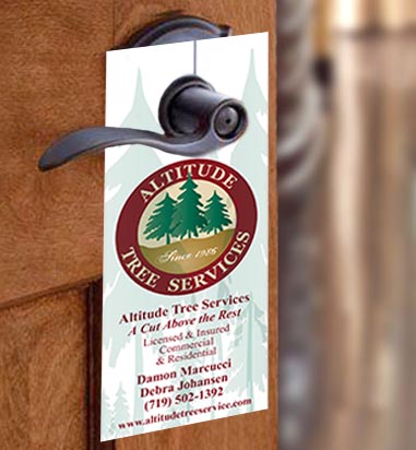 Doorknob with Altitude Tree Door Hanger Ad hanging on it