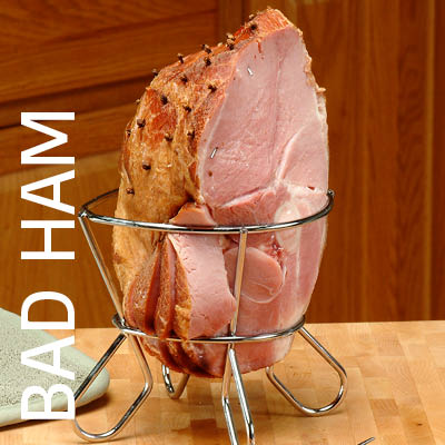 Ham in a cooking rack, quite messy before and cleaned up after