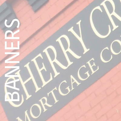 Cherry Creek Mortgage Banner on brick building